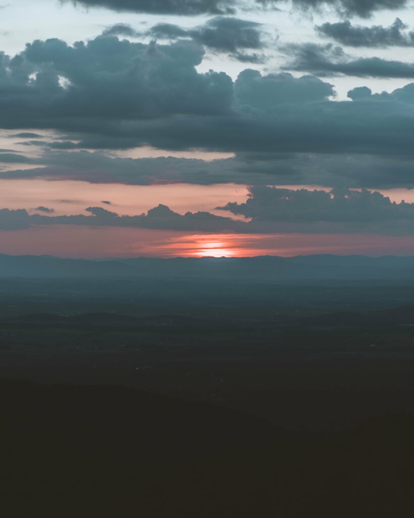 Serene Sunset HD Wallpaper: Warm Glow & Mystical Fog Background