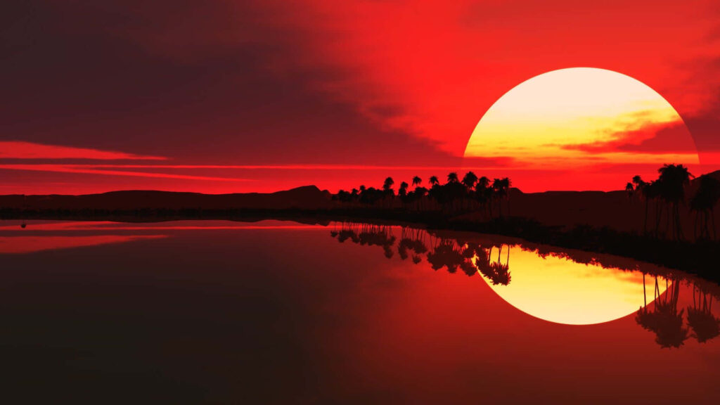 Sunset Reflections: Captivating Waterscape bathed in Red Hues Wallpaper