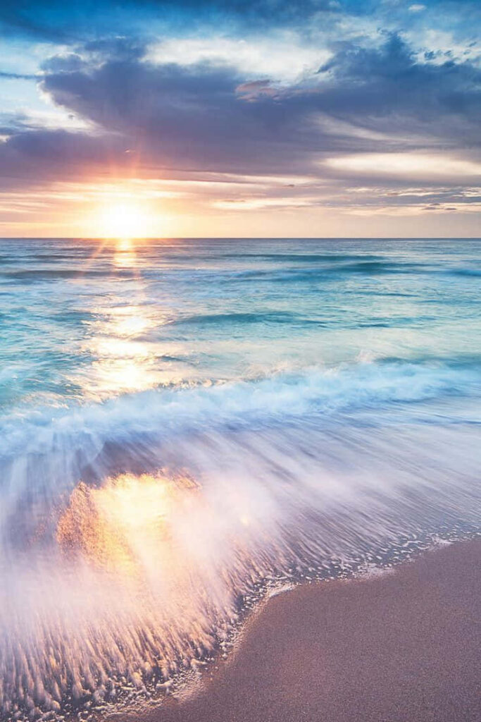 Serene Sunset Wallpaper: Tranquil Sea Over Diamond Beach