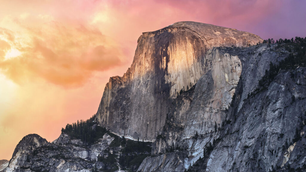 Silent Serenity: A Multimedia Mac Art of Gray Rock and Trees with Sunset Wallpaper