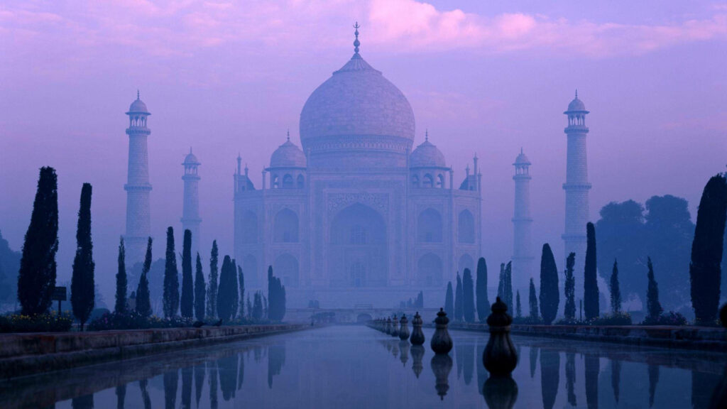 Serene Taj Mahal in Mist: Iconic Architectural Masterpiece Wallpaper