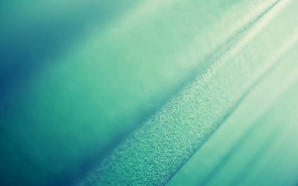 Teal Textured Wallpaper: Elegant Gradient Fabric-Inspired Background