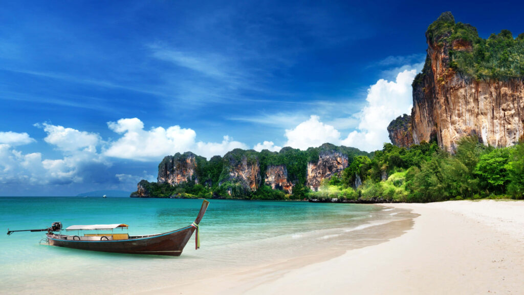 Serene Thailand Beach Wallpaper: Turquoise Waters & Lush Cliffs