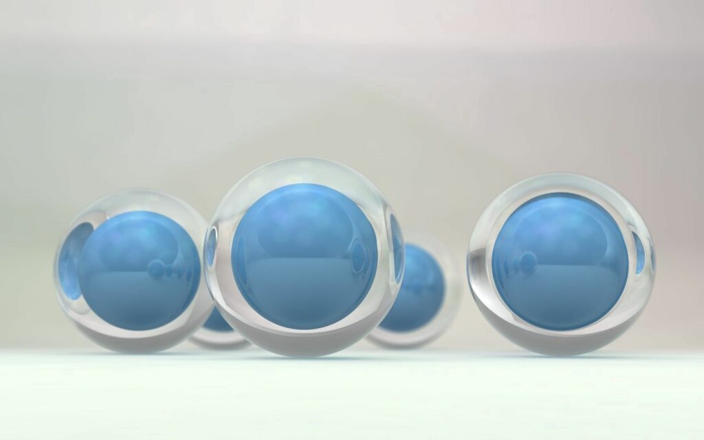 Translucent Spheres Wallpaper: Blue Core & Soft Blurred Background