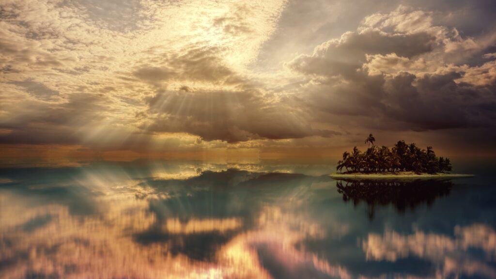 Small tropical island with lush palms under overcast sky and soft sunlight reflecting on calm ocean Wallpaper
