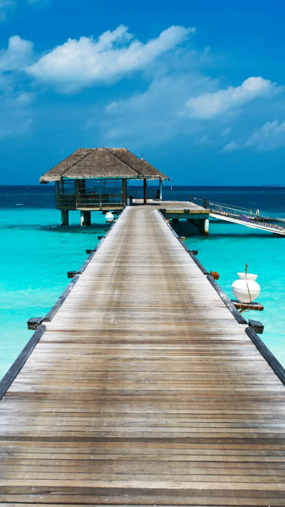 Tranquil Tropical Wallpaper: Pier, Hut & Turquoise Waters