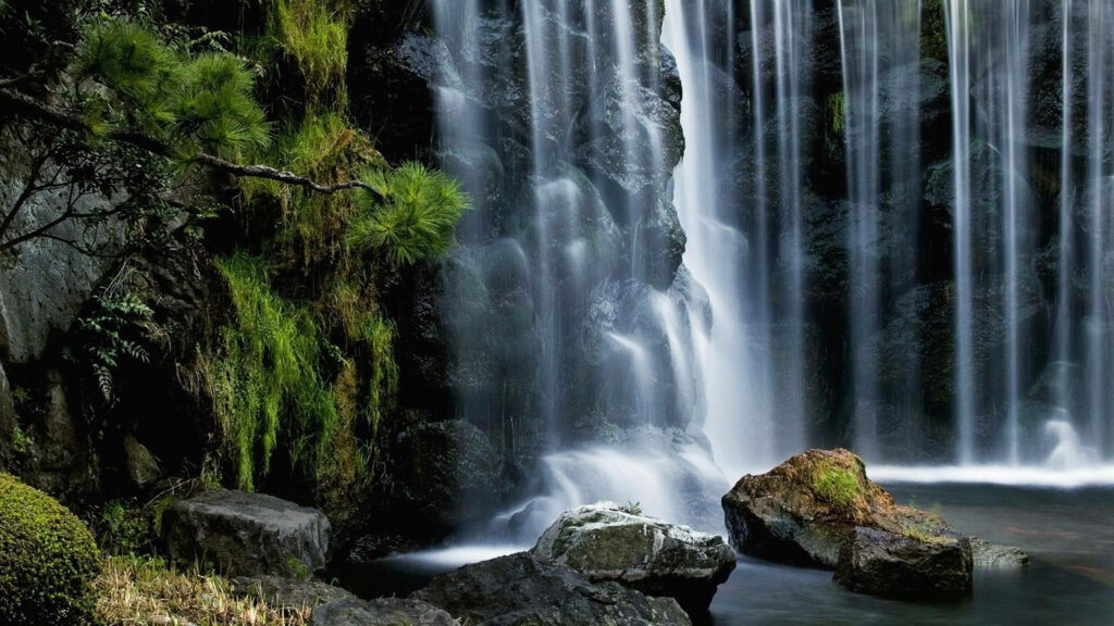 Tranquil Tropical Waterfall Wallpaper: Serene Nature Background