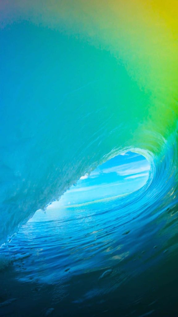 Vibrant ocean wave tube view in turquoise and blue hues iconic calming sea wallpaper background