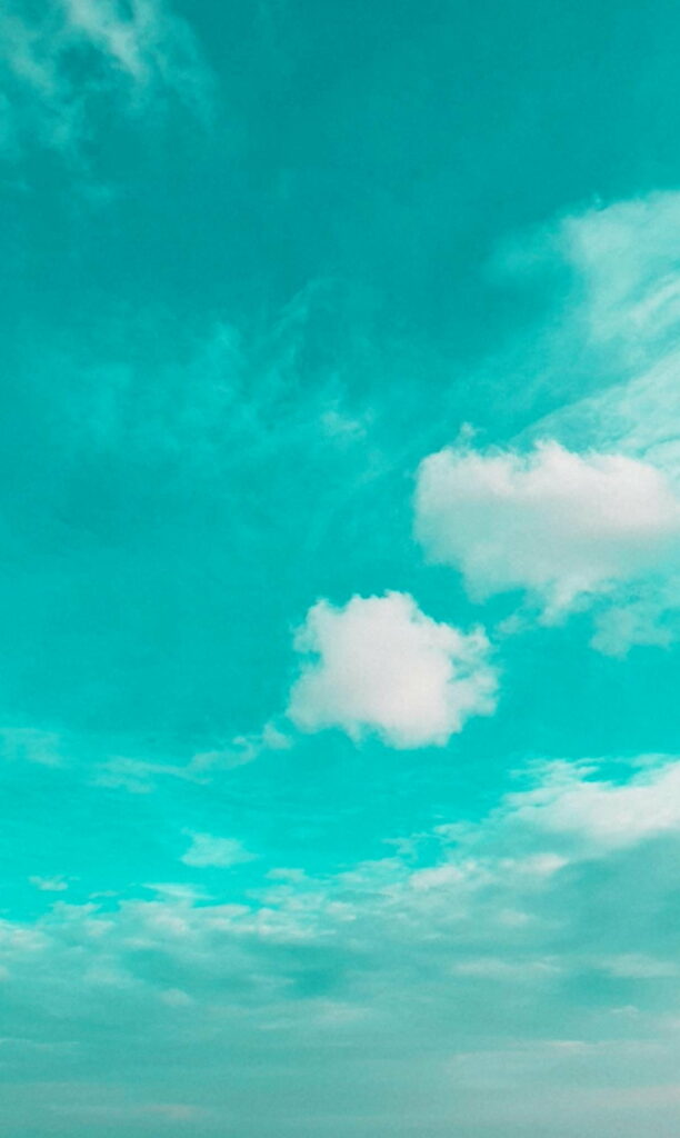 Serene Turquoise Sky HD Wallpaper: Peaceful Cloudy Background