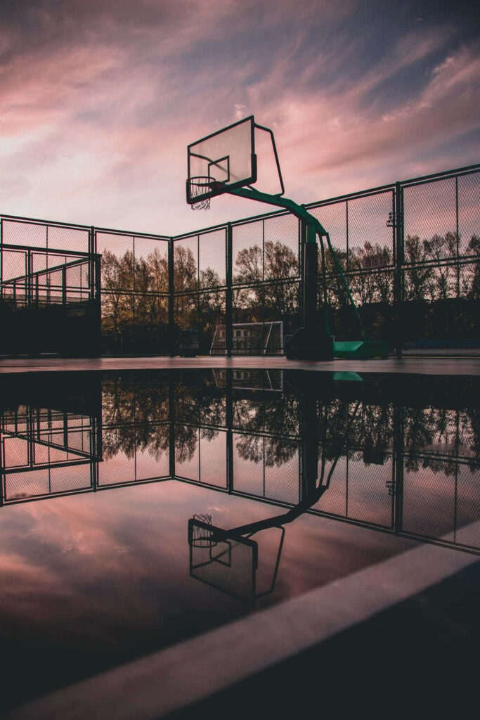 Twilight Basketball Court Wallpaper: Serenity and Reflection