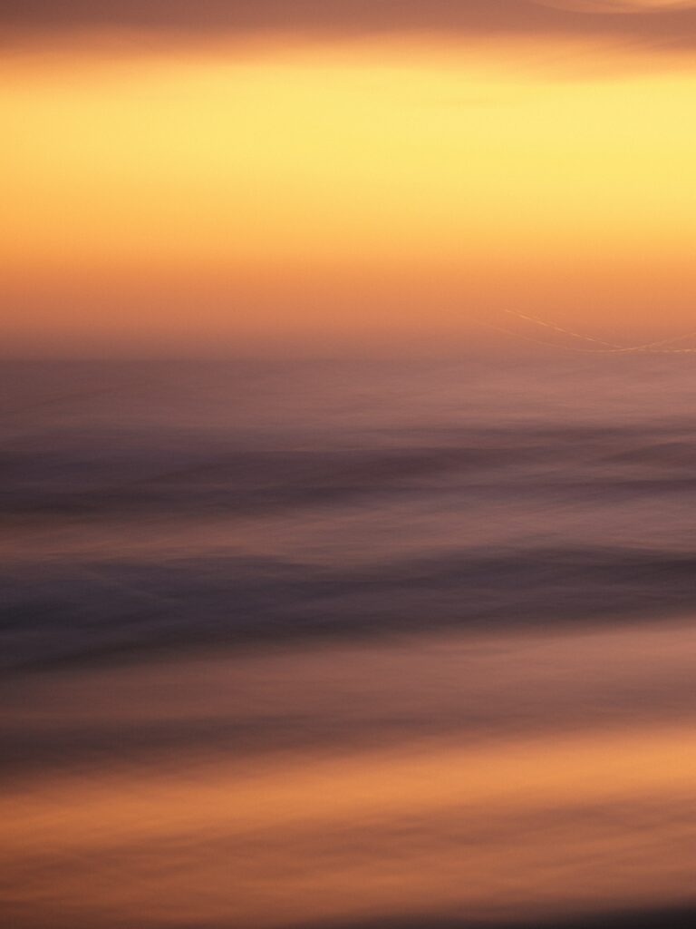 Twilight Sky Wallpaper: Serene Long Exposure with Soft Clouds
