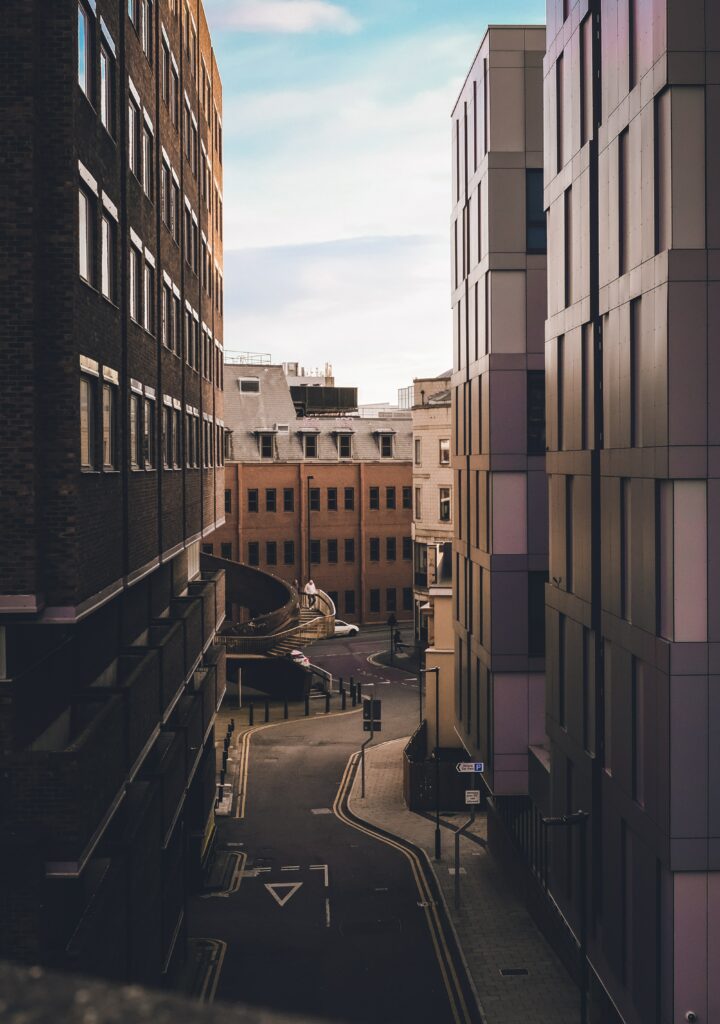 Serene Urban Street Scene - Modern & Brick Buildings Wallpaper