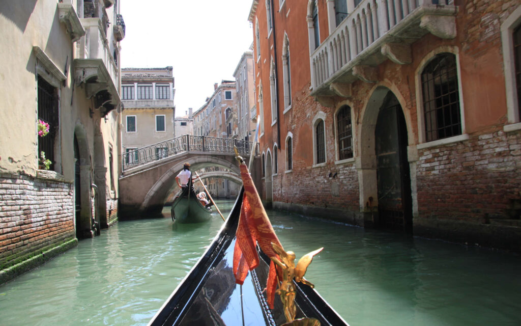 Serene Venice Gondola Ride Wallpaper Background - Timeless Beauty
