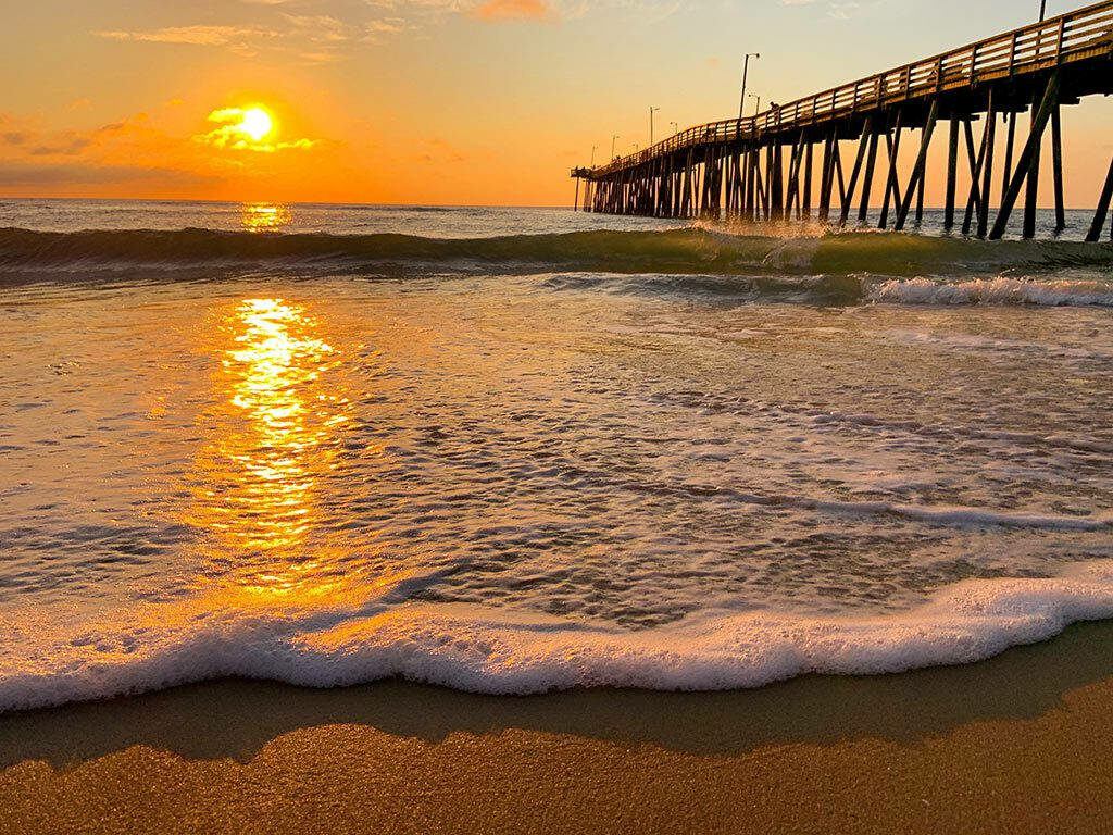 Serene Sunrise at Virginia Beach Pier - Tranquil Shoreline Wallpaper
