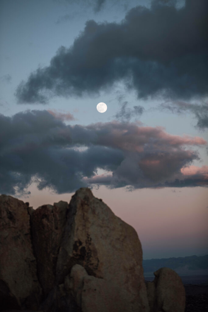 Serene Full Moon Wallpaper: Dramatic Clouds & Mountain Landscape