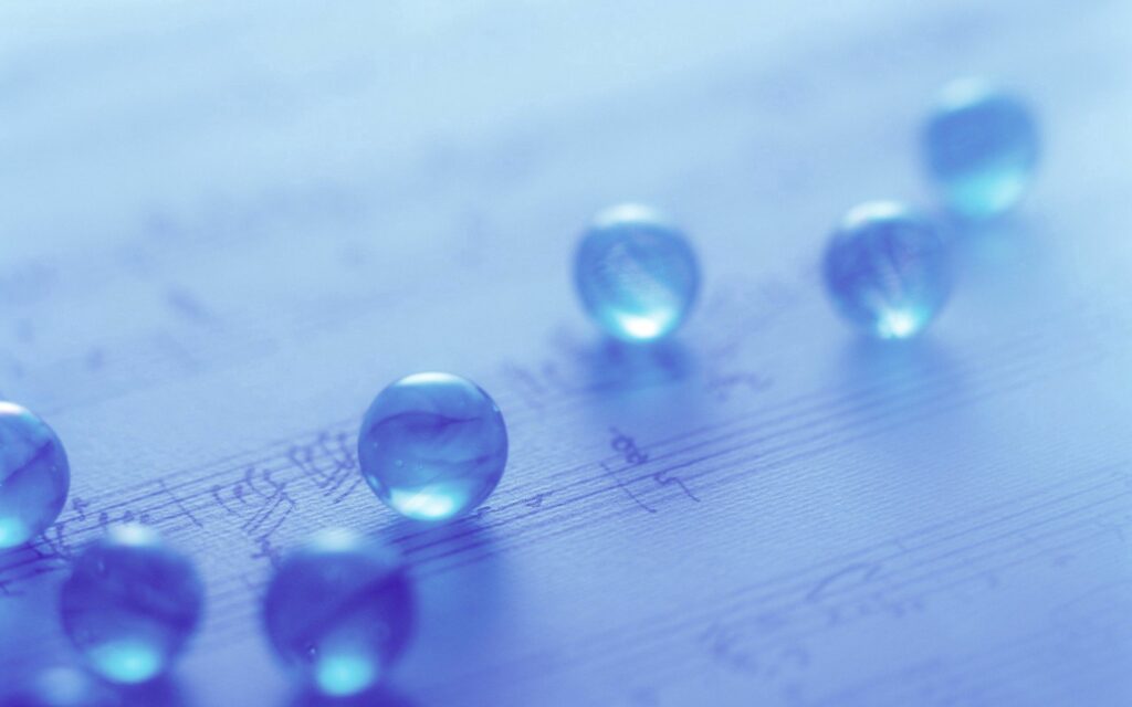 Tranquil Wallpaper: Transparent Glass Balls & Musical Note Background