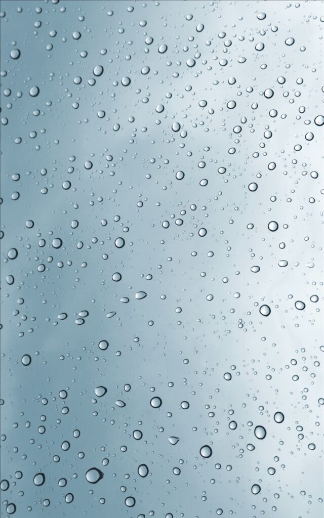 Serene Water Droplets Wallpaper: Calming Glass Surface Background
