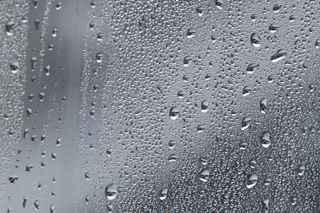 Serene Gray Wallpaper: Macro Water Droplets on Glass Background
