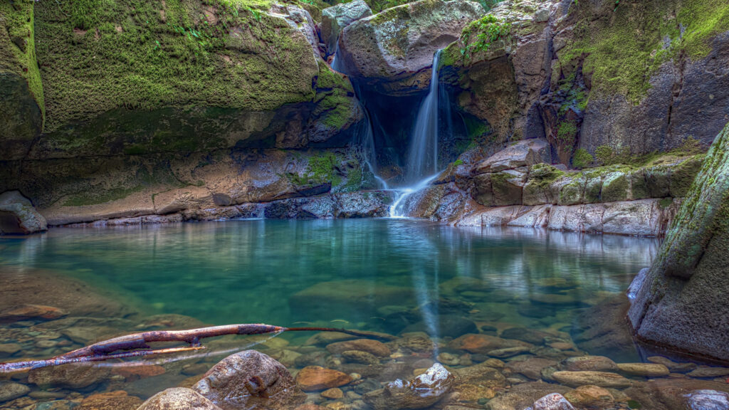 Serene Waterfall Wallpaper: Tranquil Nature Background