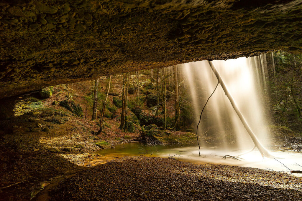 Tranquil Waterfall Wallpaper: Serene Forest Desktop Background