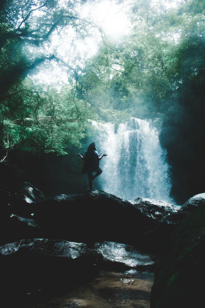 Serene Waterfall Wallpaper: Tranquil Greenery & Misty Sunlight