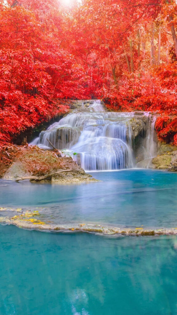 Serene Waterfall iPhone Wallpaper: Turquoise Pool & Autumn Foliage