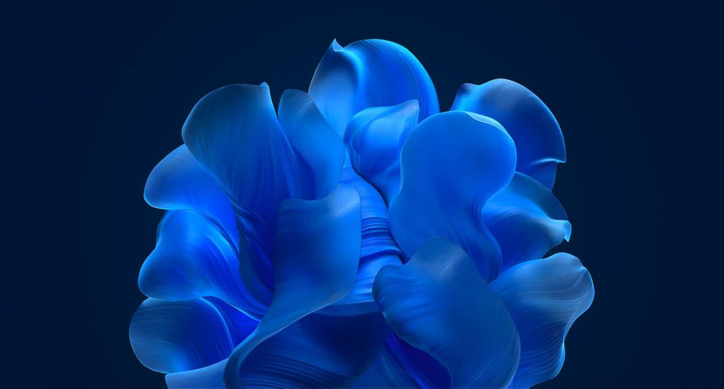 Abstract digital art of Windows 11 Bloom wallpaper with layered blue petals on dark background