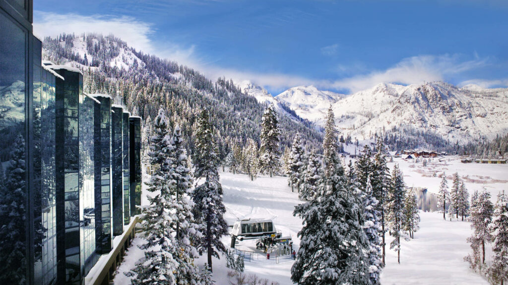 Serene Winter Landscape Wallpaper: Snowy Mountains & Modern Buildings