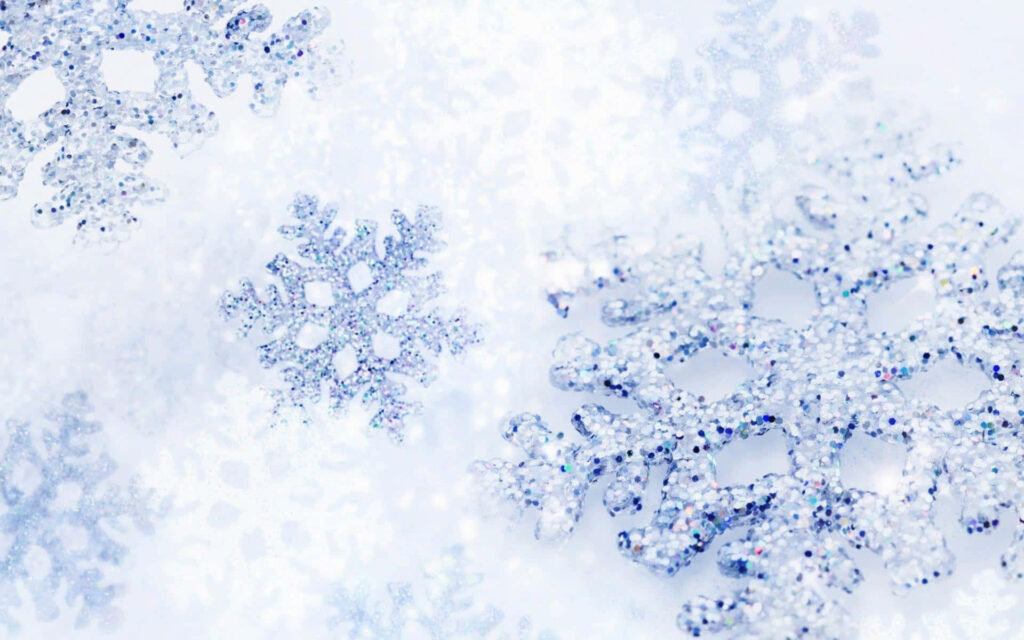 Serene Winter Scene Wallpaper with Detailed Snowflakes Background