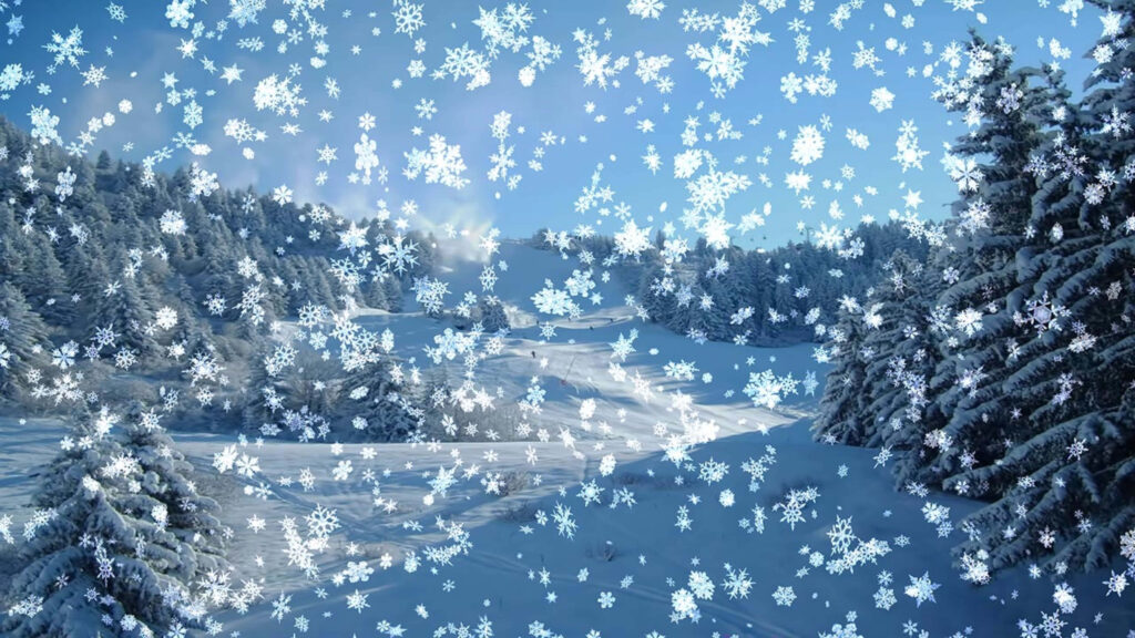 Serene Winter Wallpaper: Peaceful Snowfall Over a Snowy Forest