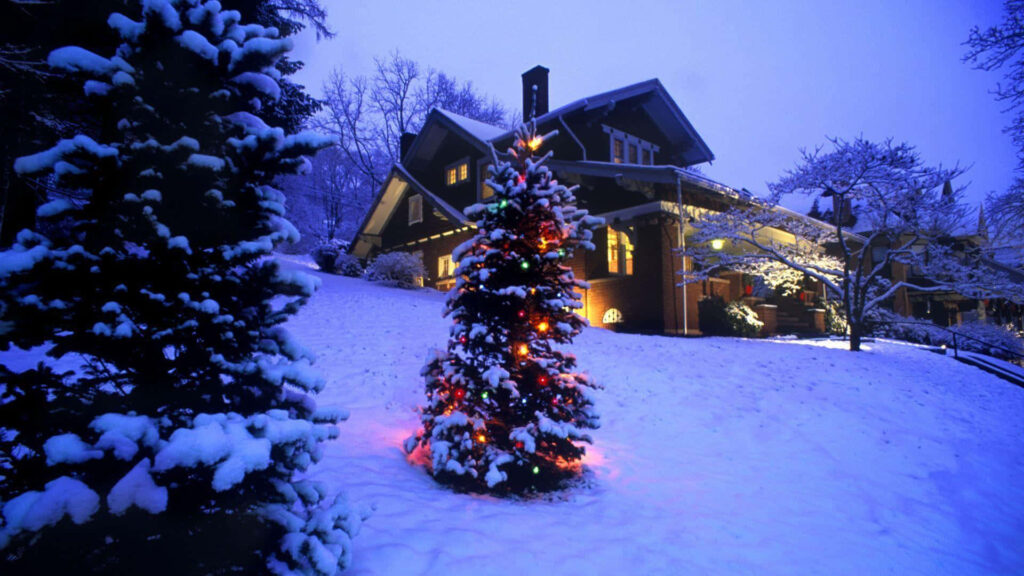 Cozy Winter Wallpaper: Snowy House & Festive Christmas Tree