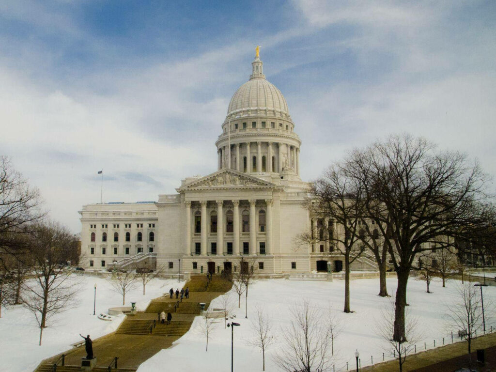 Serene Winter Wallpaper: Wisconsin State Capitol in Snowy Splendor