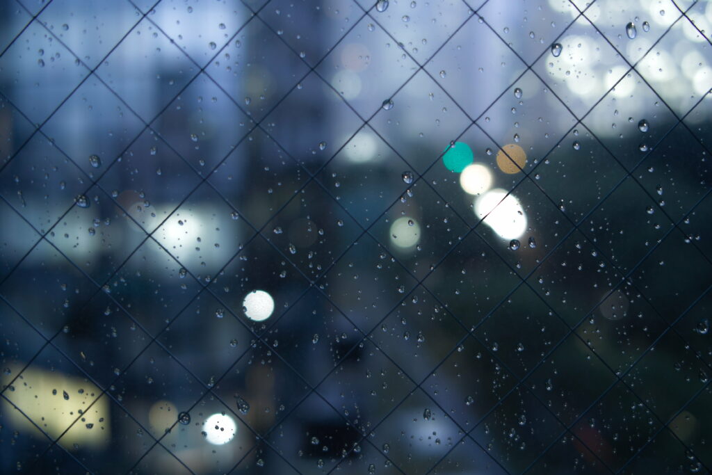 Watercolor Symphony: Capturing the Rainy Wind on Glass Wallpaper