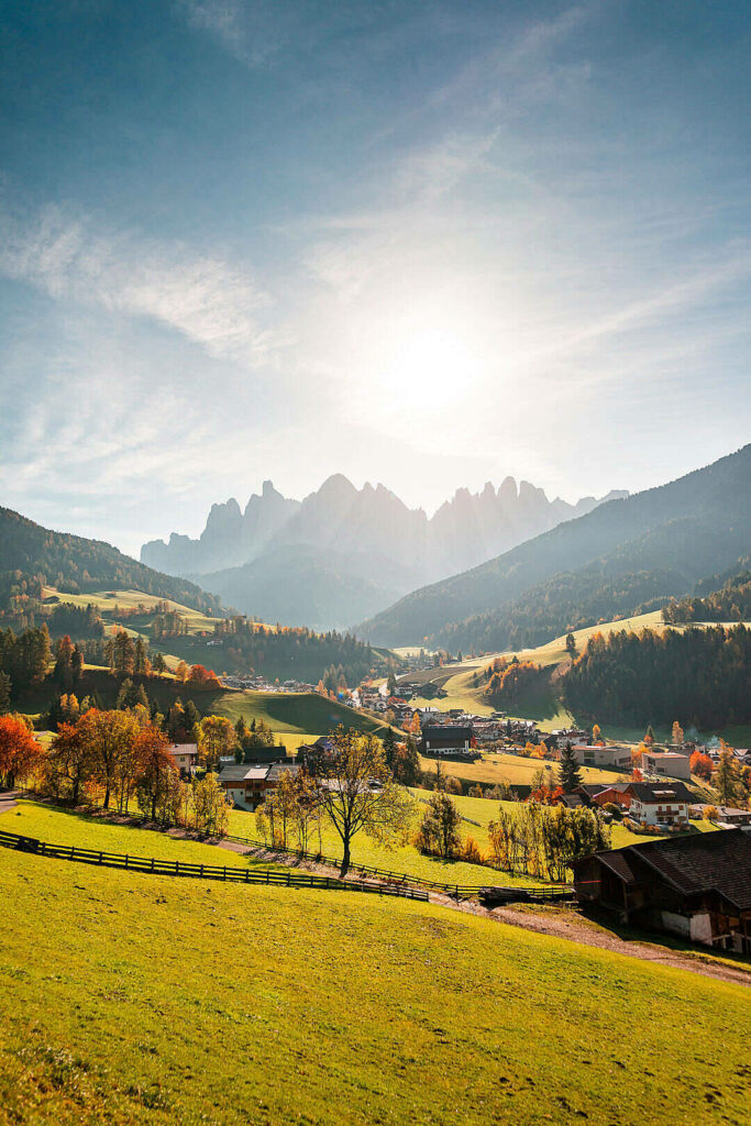 Captivating Dolomites: Stunning HD Landscape of Tranquil Ranui Village on a Serene Afternoon Wallpaper
