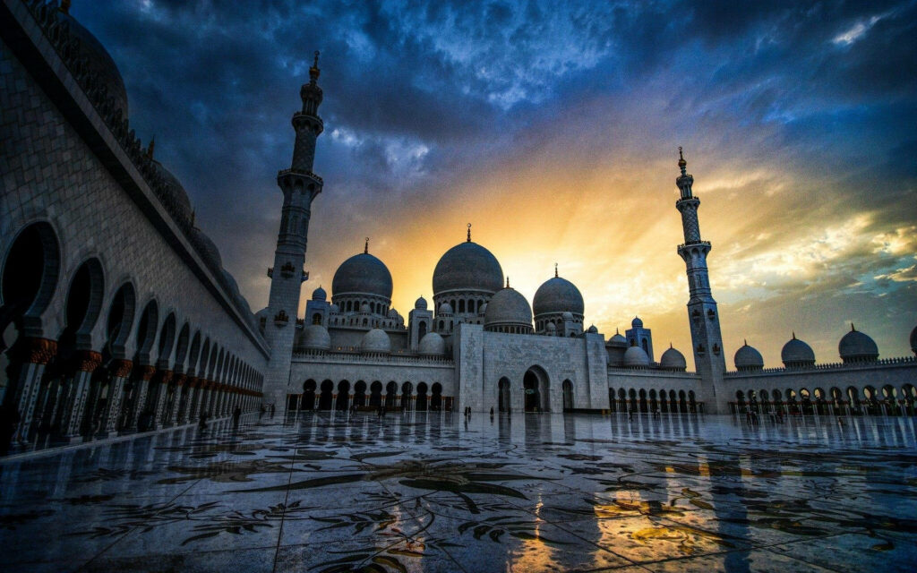 Majestic Mosque: A Breathtaking Sunset Shot of Islamic Architecture Wallpaper