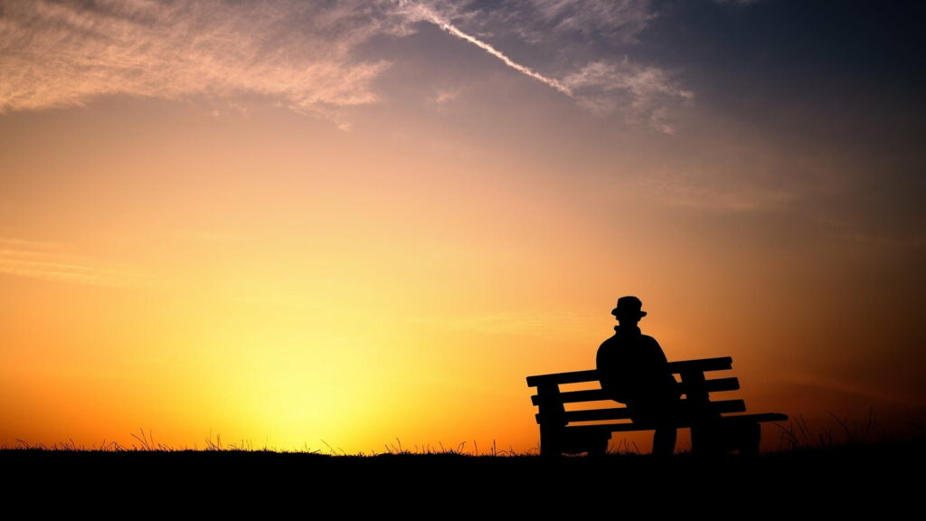 Serene Silhouette Sitting on Bench Amidst Idyllic Nature - HD Wallpaper Background Photo