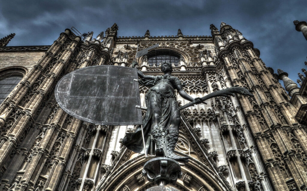 Seville Cathedral Wallpaper: Intricate Architecture & Iconic Statue