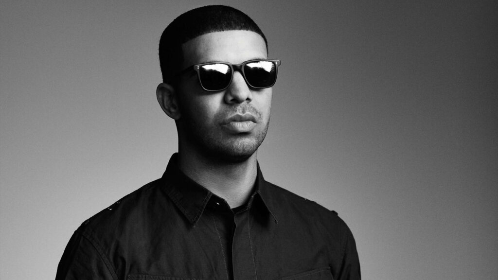 Shades of Grey: Drake Rocks Monochrome Look in Sleek Wallpaper