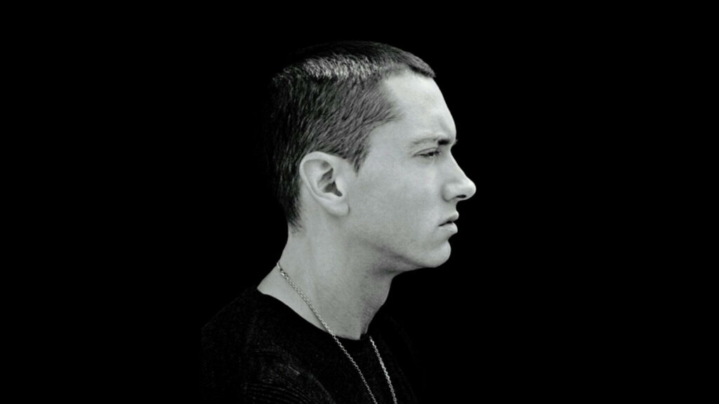 The Raw Edge of Eminem: A Unique Sideview Portrait Wallpaper