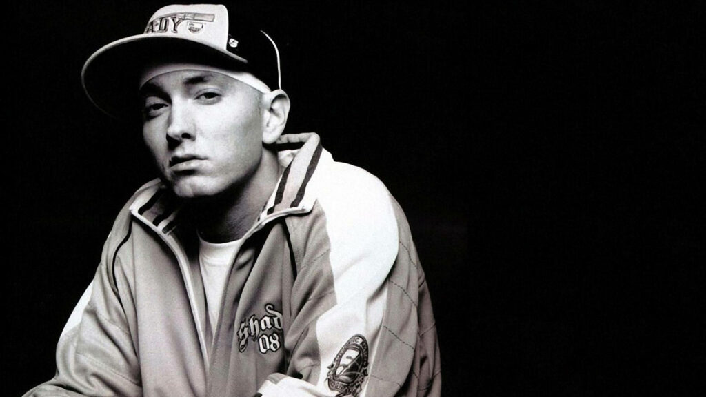 Shady Style: Eminem Rocks Iconic Outfits in Stunning Black and White Wallpaper