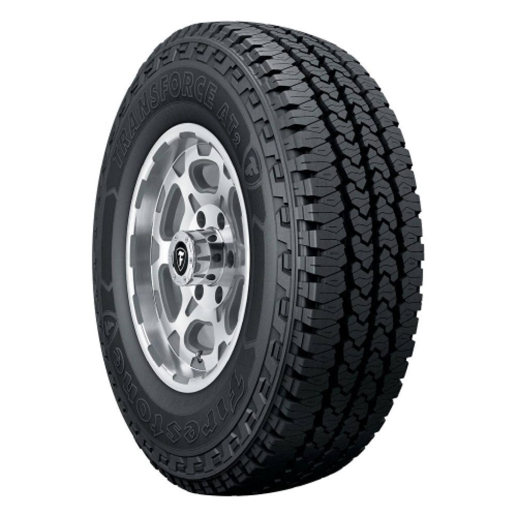 Firestone Transforce AT2 all-terrain tire on silver alloy rim sharp studio shot white background Wallpaper