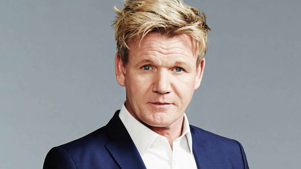 Stylish Gordon Ramsay Wallpaper: Confidence in a Blue Suit