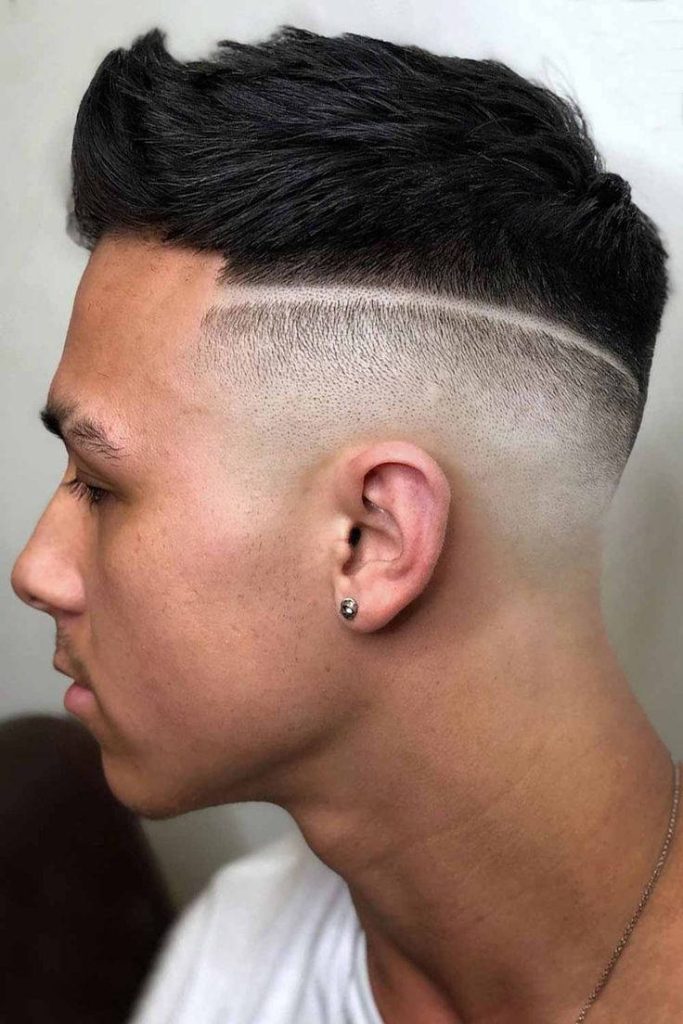 Sharp men’s hairstyle textured quiff hard part clean skin fade modern grooming wallpaper