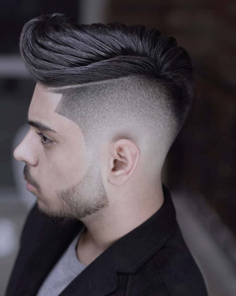Sharp modern men's hairstyle with taper fade quiff crisp hard part and groomed facial hair wallpaper