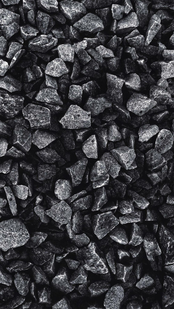 Sharp and Serene: A Top-Down Snapshot of a Piled Rocks iPhone Wallpaper