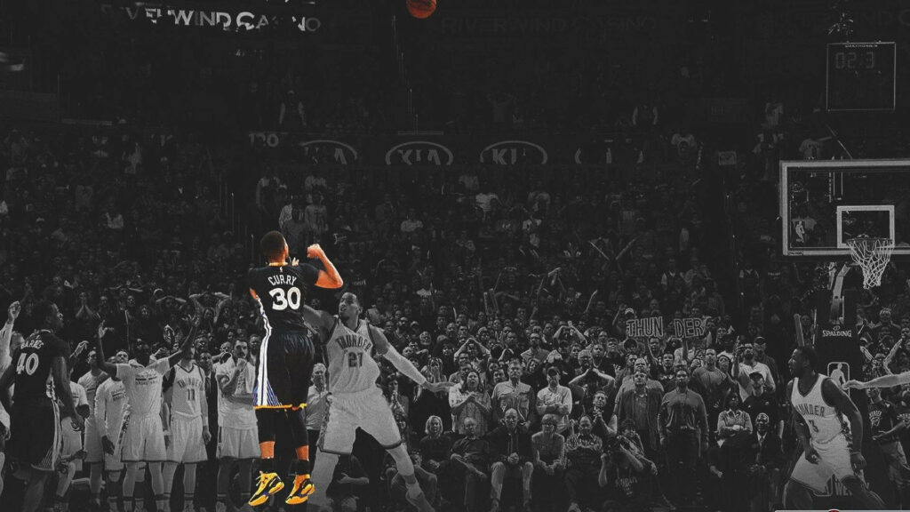Sharpshooter Splashes Net: HD Basketball Action Shot of Steph Curry's Iconic 3-Pointer Wallpaper