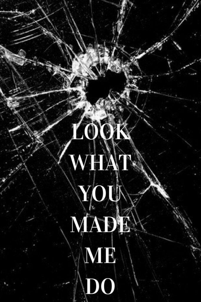 Shattered Technology: Eerily Symbolic Computer Wallpaper with Fractures and an Abyss, Echoing the Message 'look What You Made Me Do'