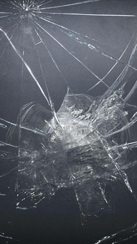 Shattered Impressions: Captivating Cracked Screen Background Photo Wallpaper