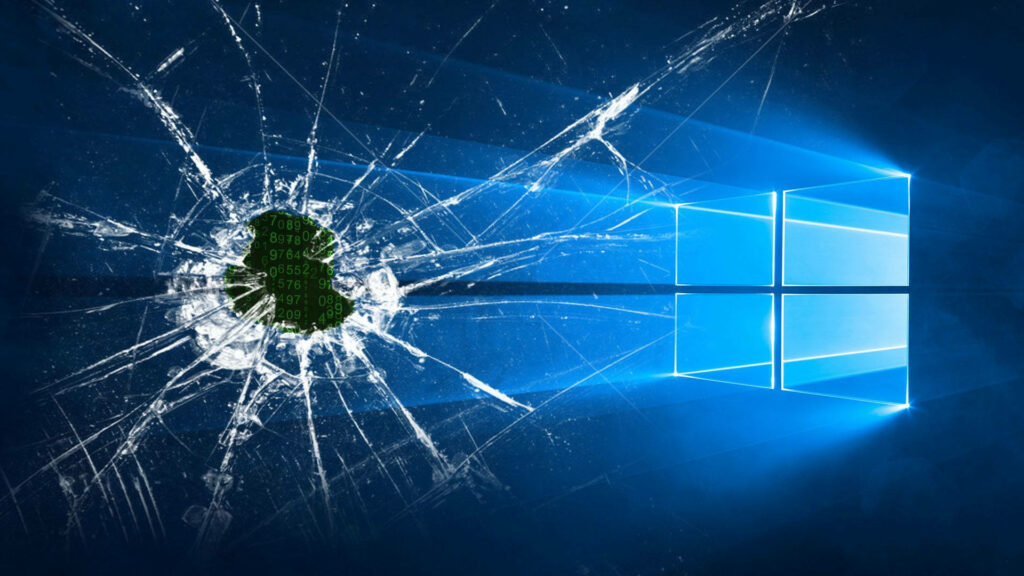 Shattered window wallpaper broken glass effect glowing Windows logo dark blue digital background