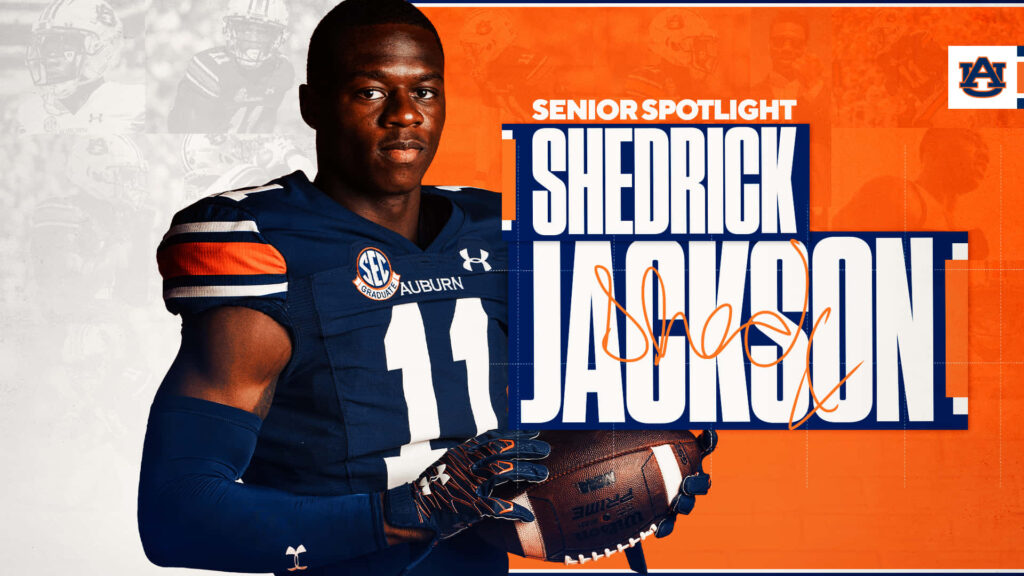 Shedrick Jackson Auburn football senior spotlight wallpaper holding ball against Auburn background
